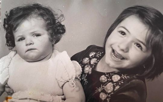 Sanela and her sister as children