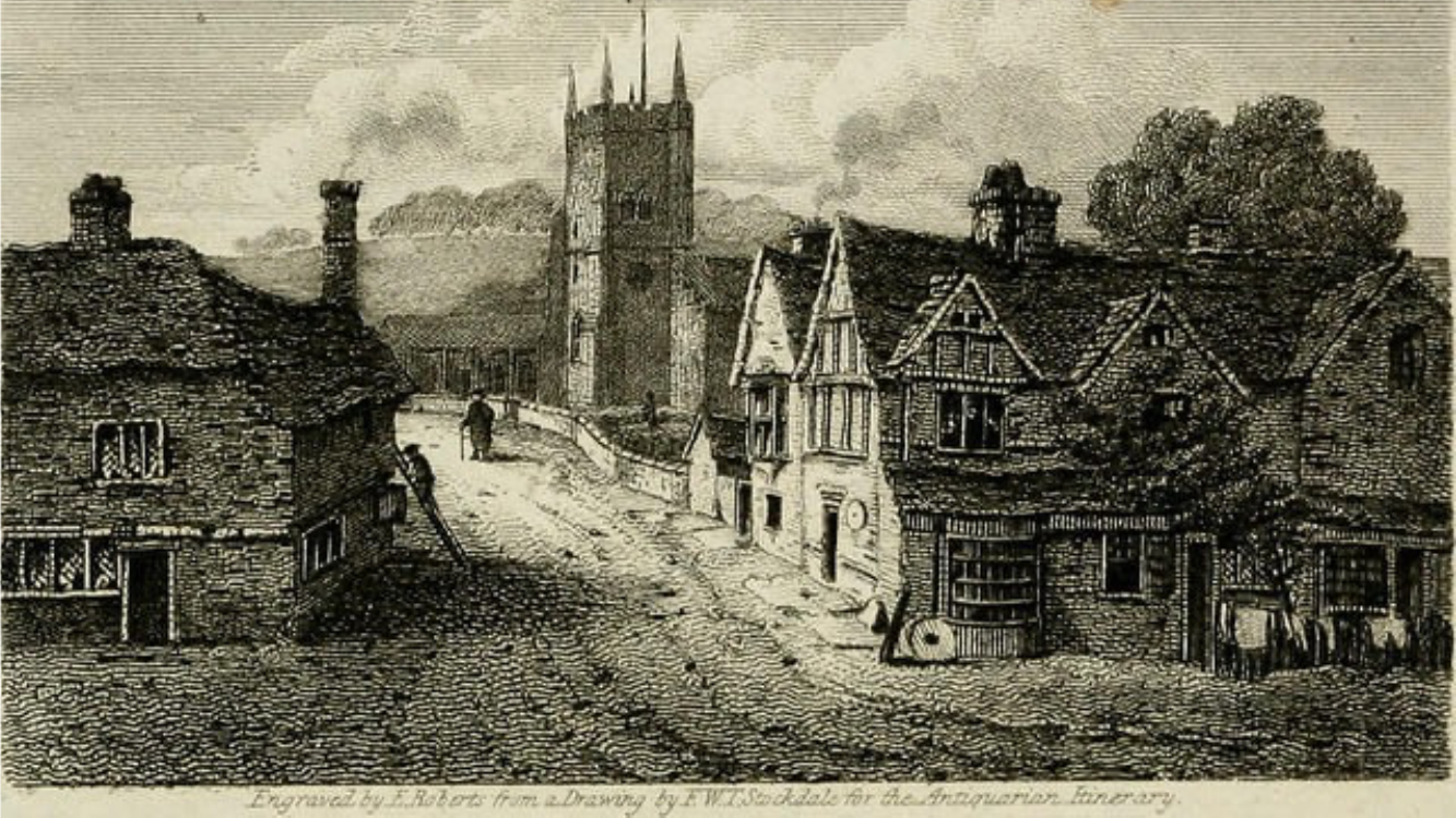 Old black and white photograph showing English village